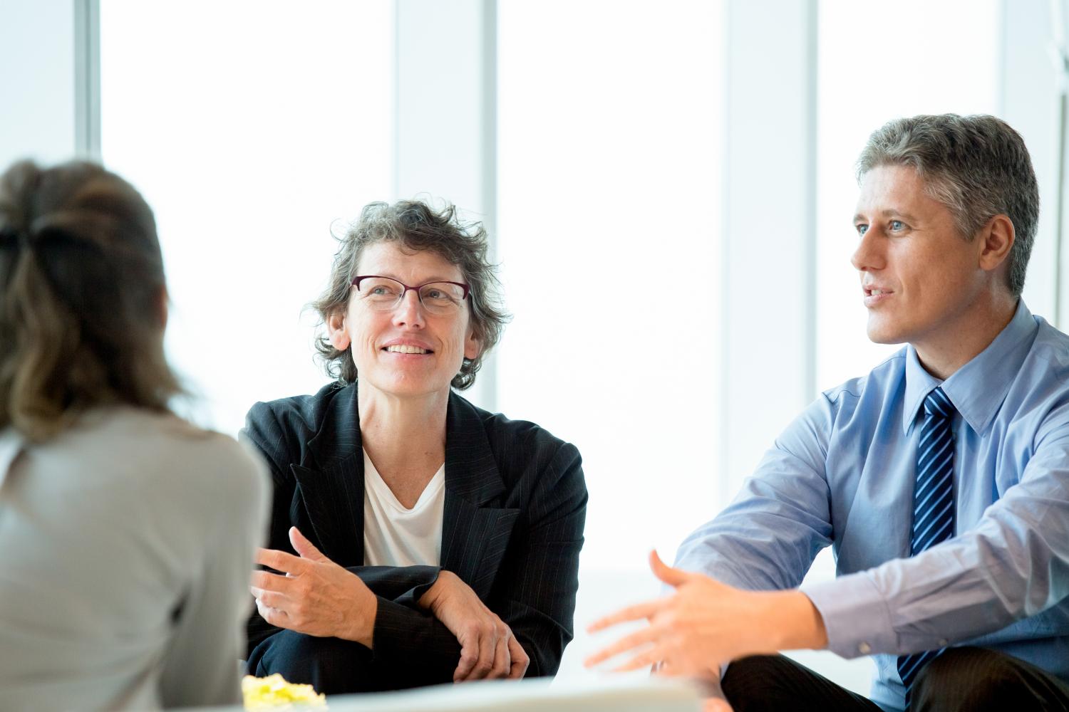 man and woman in business meeting