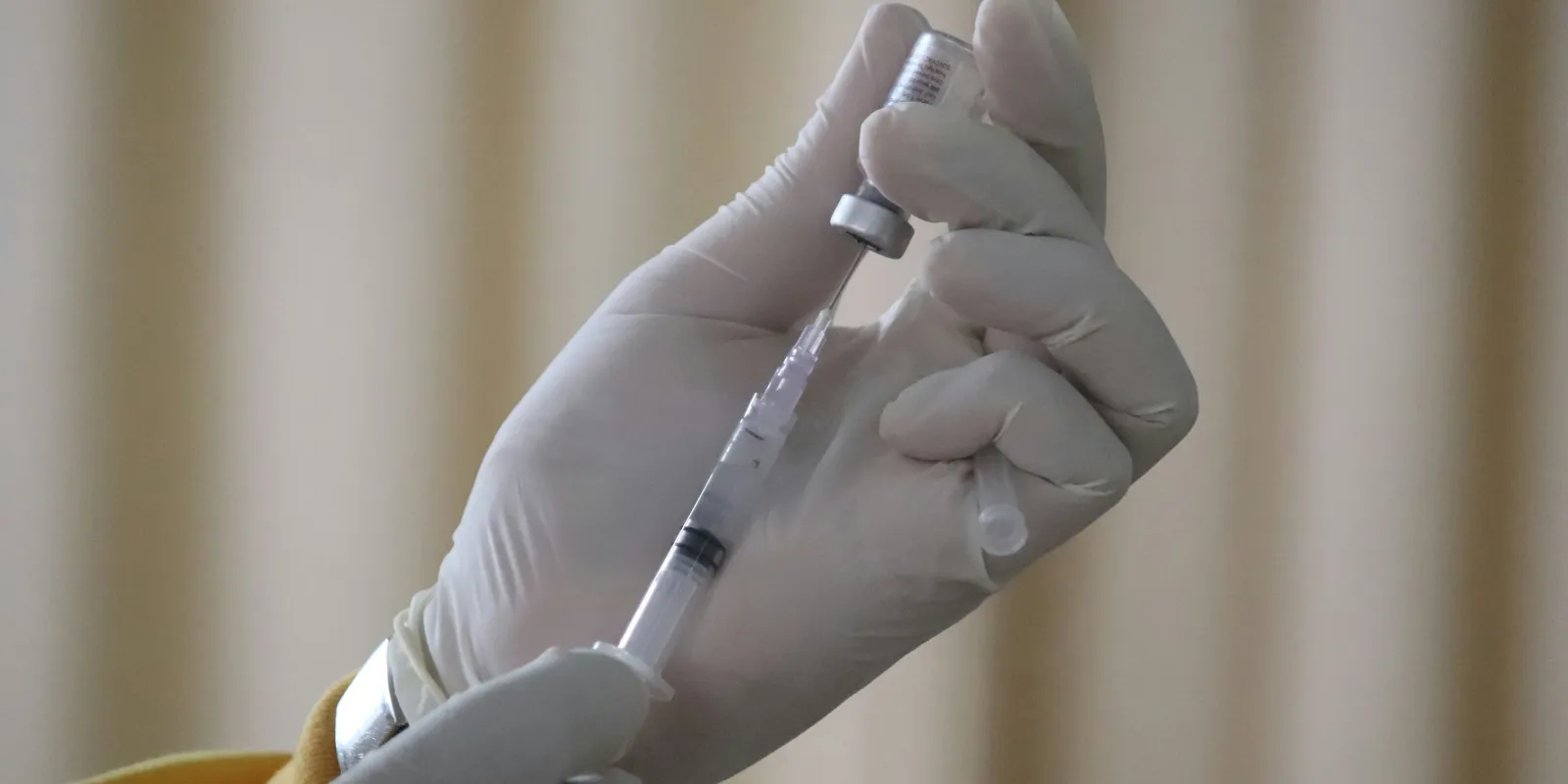 Doctor administering injections