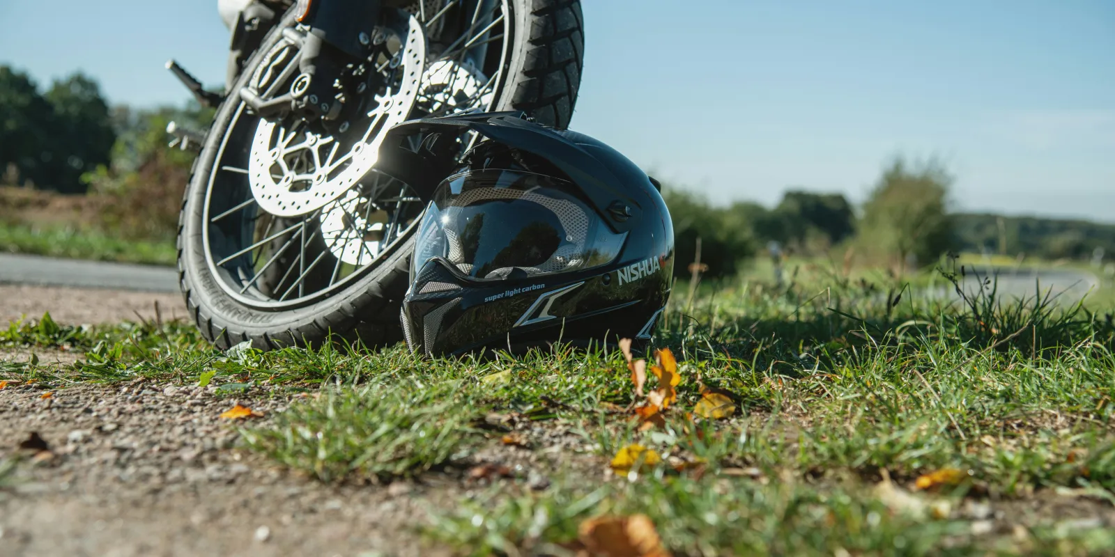 Motorbike and helmet on the floor