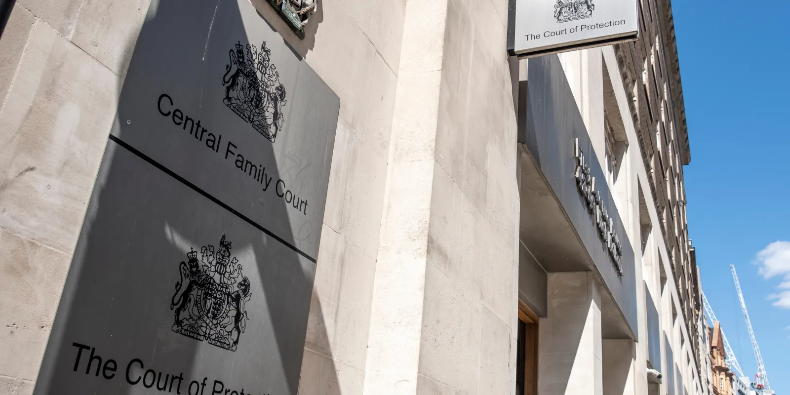 Exterior shot of building with the signs showing Central Family Court and The Court of Protection