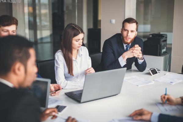 business meeting at board table