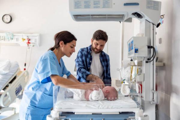 MIdwife with baby