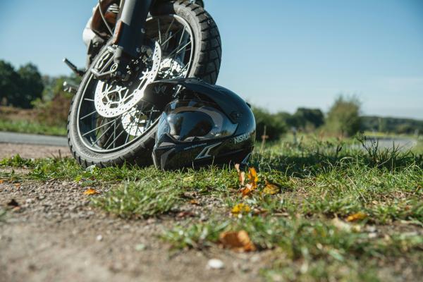 Motorbike and helmet on the floor